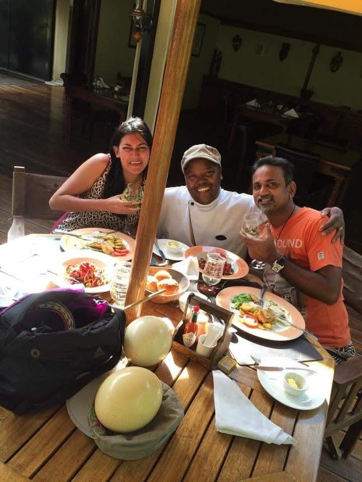 Travelers on a cultural village visit in the Maasai Mara